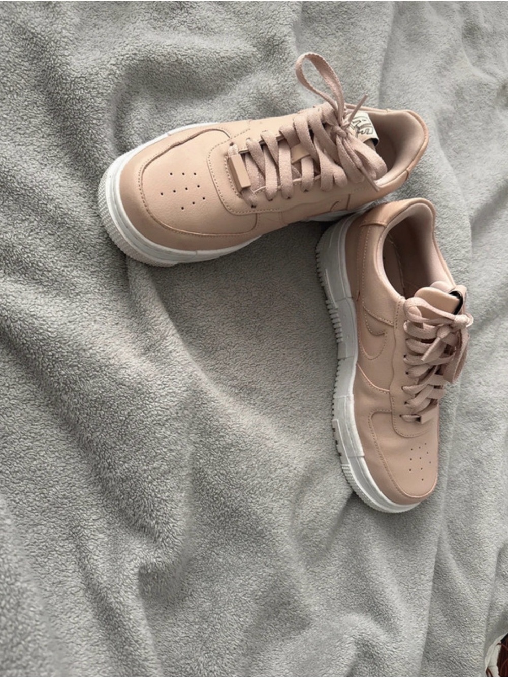Nike Women's Pale Pink Low-Top Sneakers with White Sole